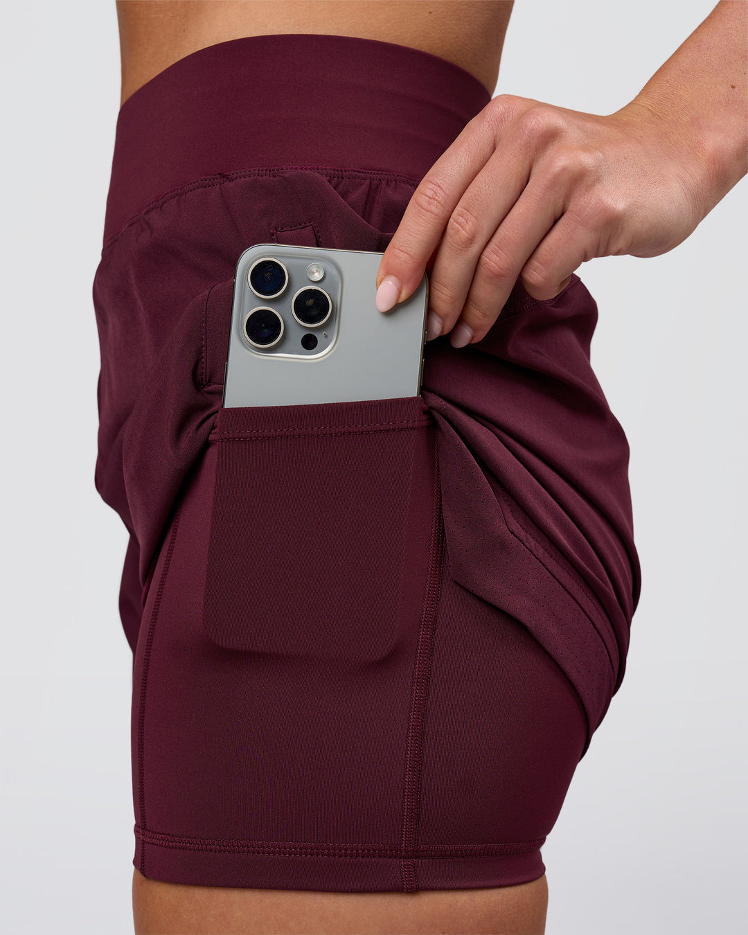 Woman wearing Challenger 5" Lined Performance Short - Cherry Lacquer | Model:Issy | Size:XS - view 10