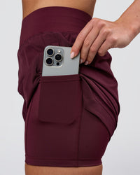 Woman wearing Challenger 5" Lined Performance Short - Cherry Lacquer | Model:Issy | Size:XS | Thumbnail Index: 9