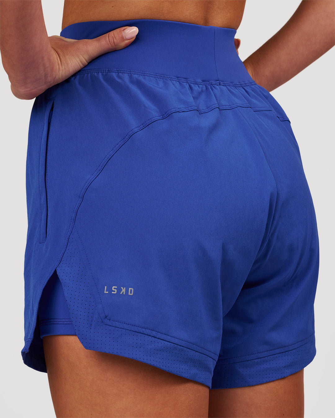 Woman wearing Challenger 5" Lined Performance Short - Power Cobalt | Model:Issy | Size:XS - view 1