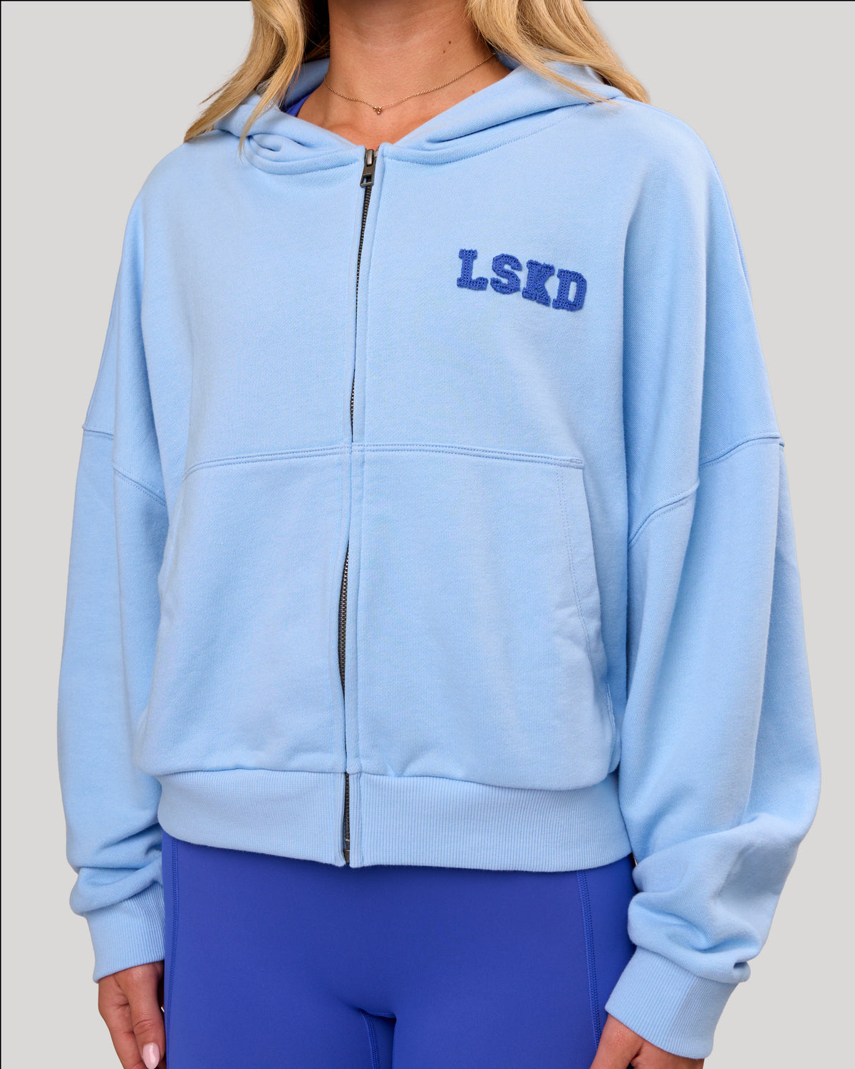 Woman wearing Distress French Terry Full Zip Hoodie - Open Air | Model: Issy | Size: XS