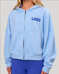 Woman wearing Distress French Terry Full Zip Hoodie - Open Air | Model: Issy | Size: XS | Thumbnail Index: 0