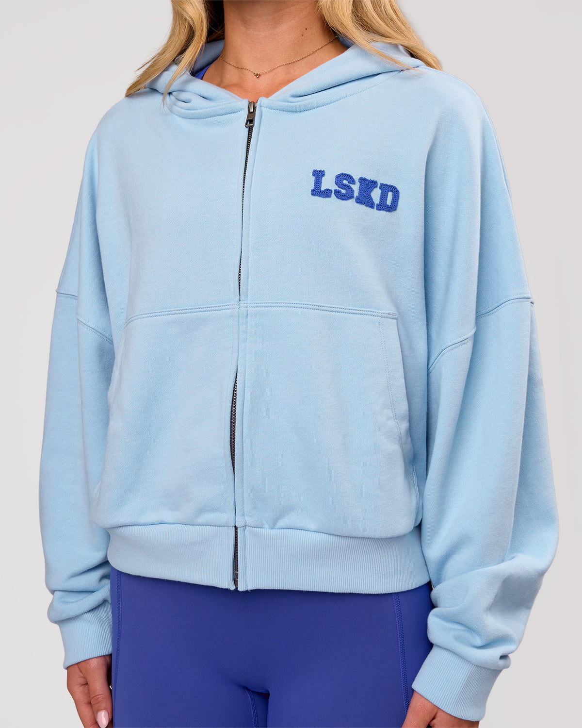 Woman wearing Distress French Terry Full Zip Hoodie - Open Air | Model:Issy | Size:XS - view 1