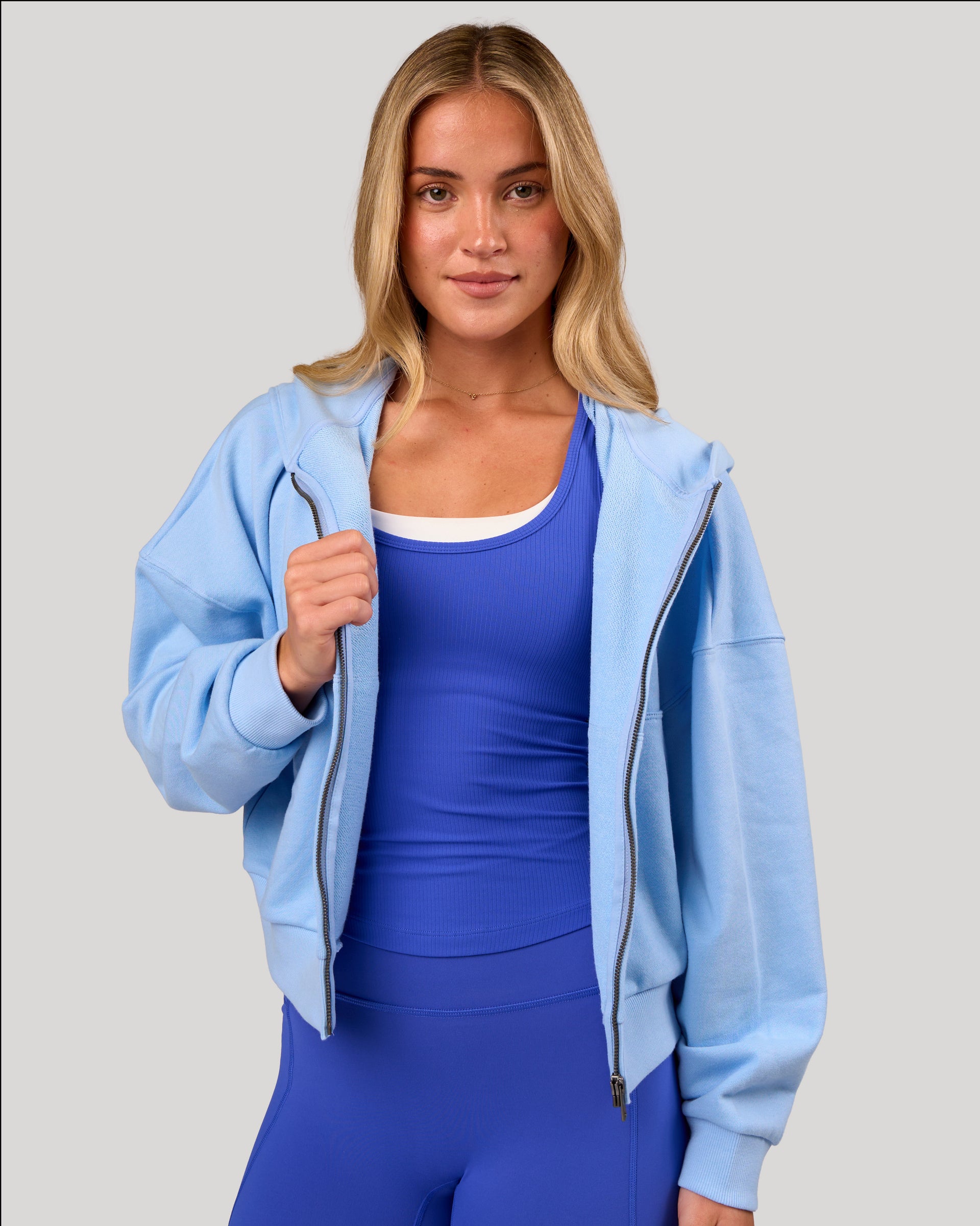 Woman wearing Distress French Terry Full Zip Hoodie - Open Air | Model: Issy | Size: XS