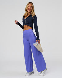 Woman wearing Elixir High-Rise Petite Pant - Bluebell | Model:Issy | Size:XS | Thumbnail Index: 0