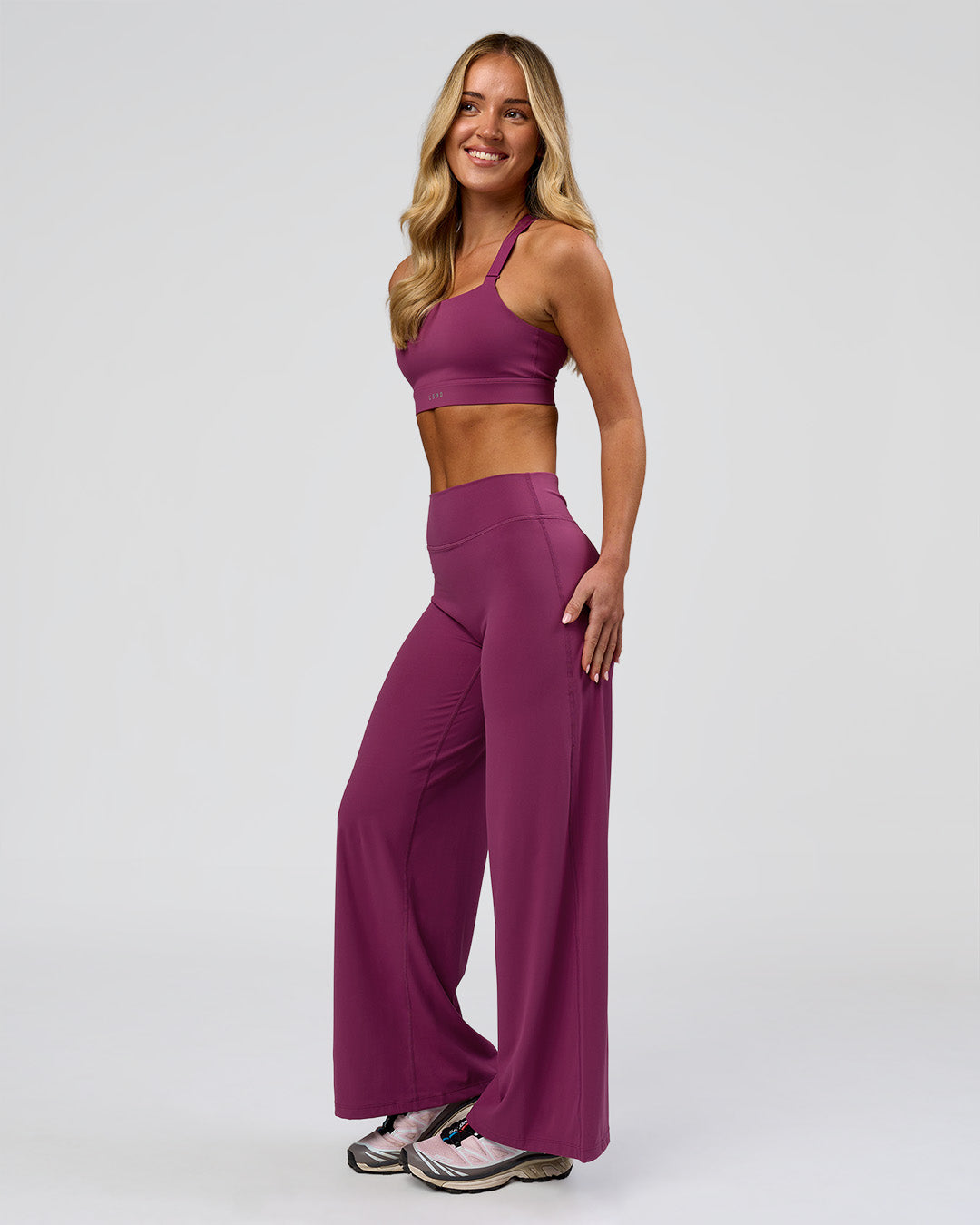 Woman wearing Elixir High-Rise Petite Pant - Boysenberry | Model:Issy | Size:XS - view 16