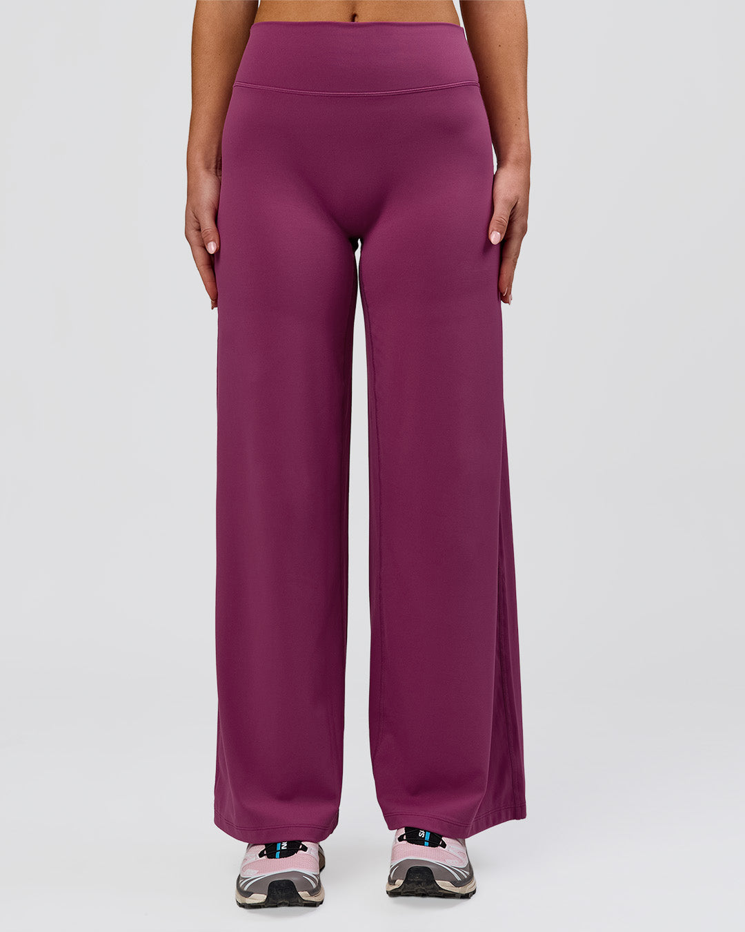 Woman wearing Elixir High-Rise Petite Pant - Boysenberry | Model:Issy | Size:XS - view 17