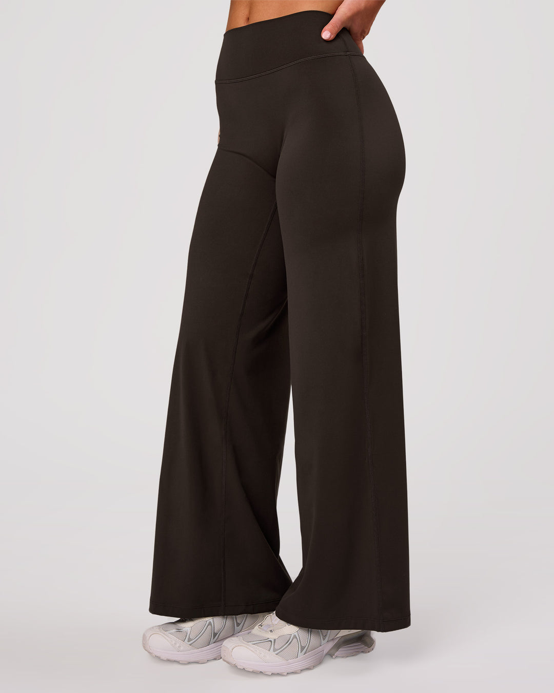 Woman wearing Elixir High-Rise Petite Pant - Ground Coffee | Model:Issy | Size:XS - view 5