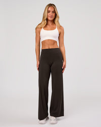 Woman wearing Elixir High-Rise Petite Pant - Ground Coffee | Model:Issy | Size:XS | Thumbnail Index: 7