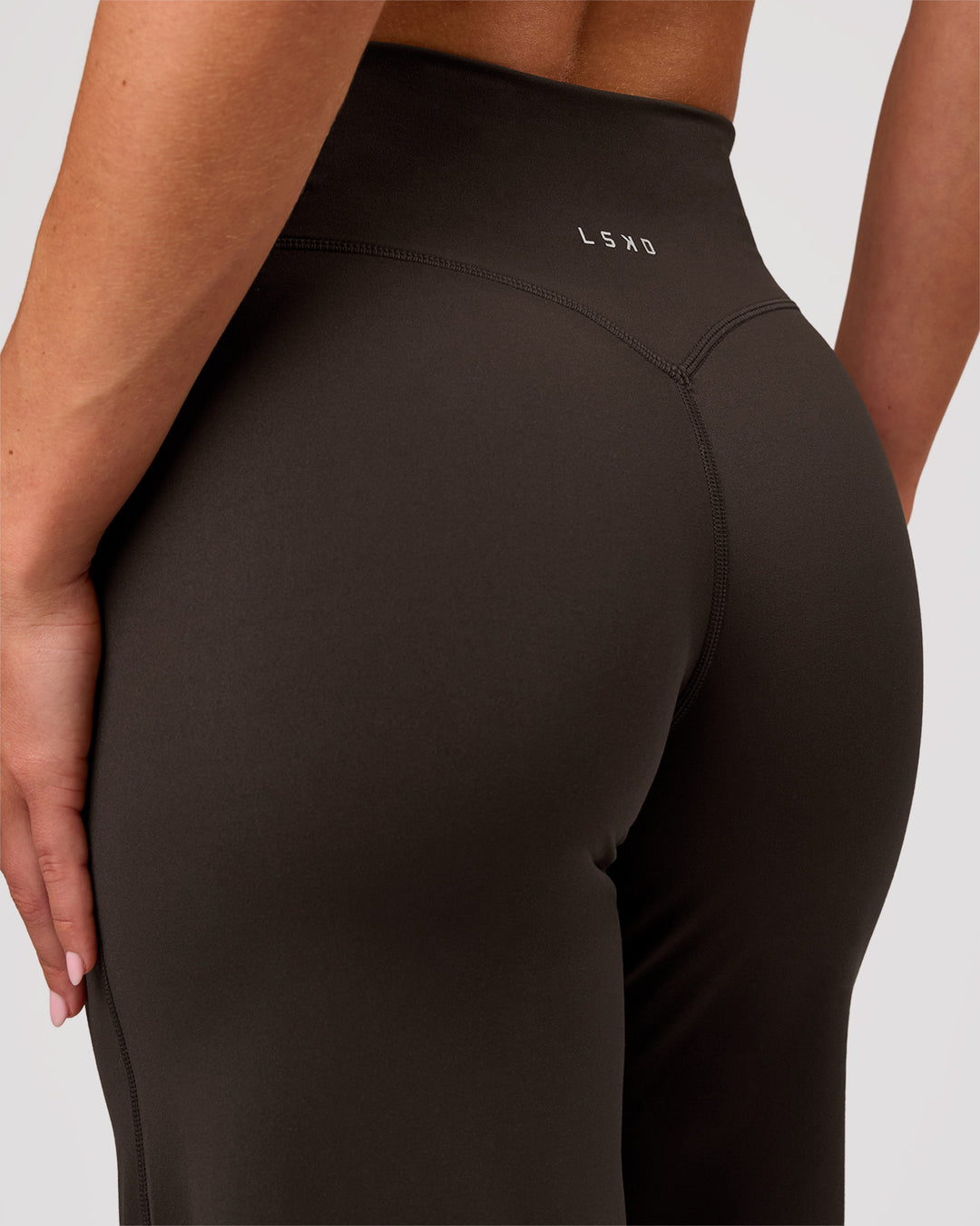 Woman wearing Elixir High-Rise Petite Pant - Ground Coffee | Model:Issy | Size:XS - view 9