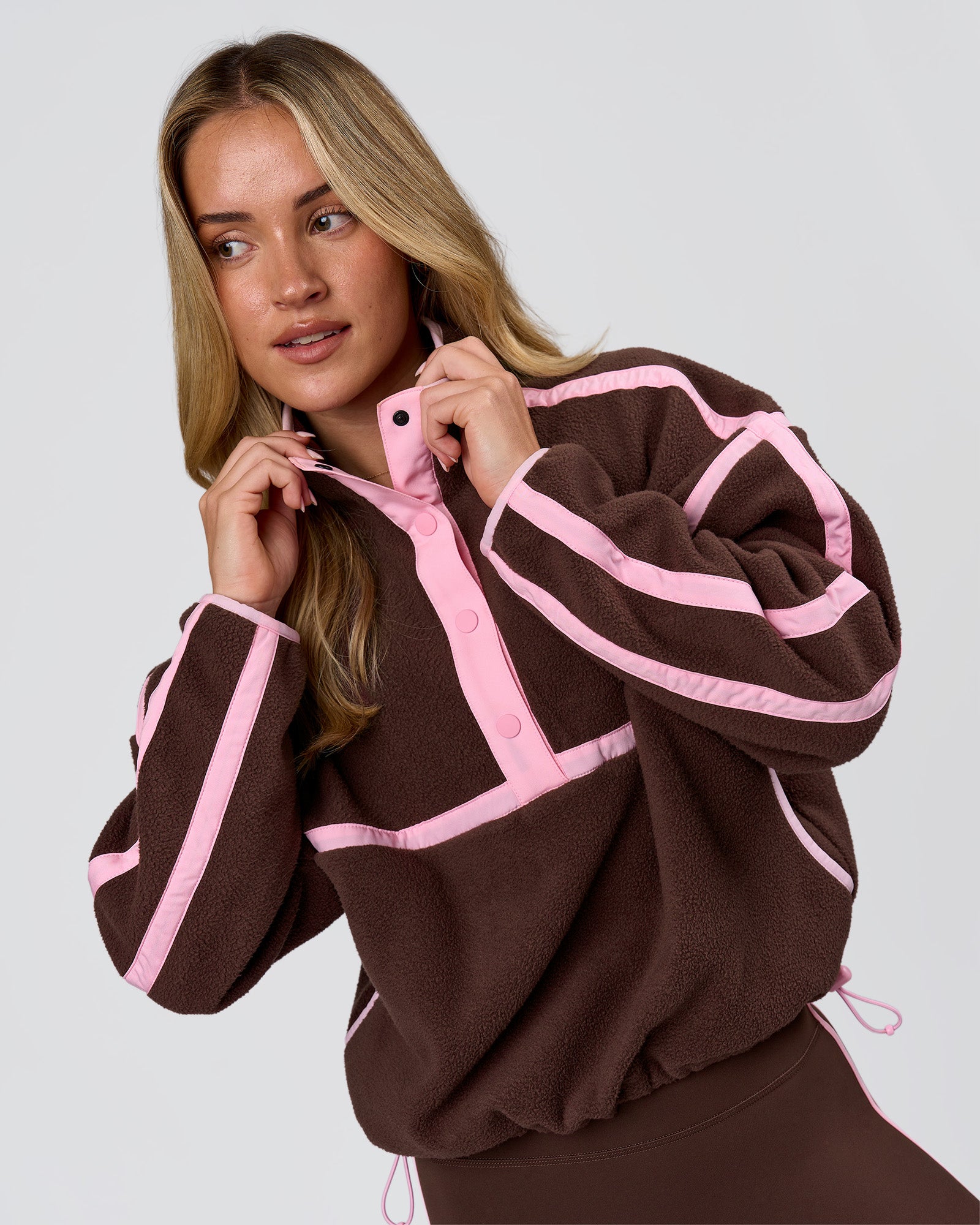 Woman wearing Expedition Pop Over - Hot Chocolate-Pink Rose | Model:Issy | Size:XS