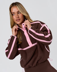 Woman wearing Expedition Pop Over - Hot Chocolate-Pink Rose | Model:Issy | Size:XS | Thumbnail Index: 1
