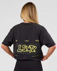 Woman wearing Benchmark FLXCotton Oversized Tee - Onyx-Yellow Fizz | Model:Issy | Size:XS | Thumbnail Index: 9