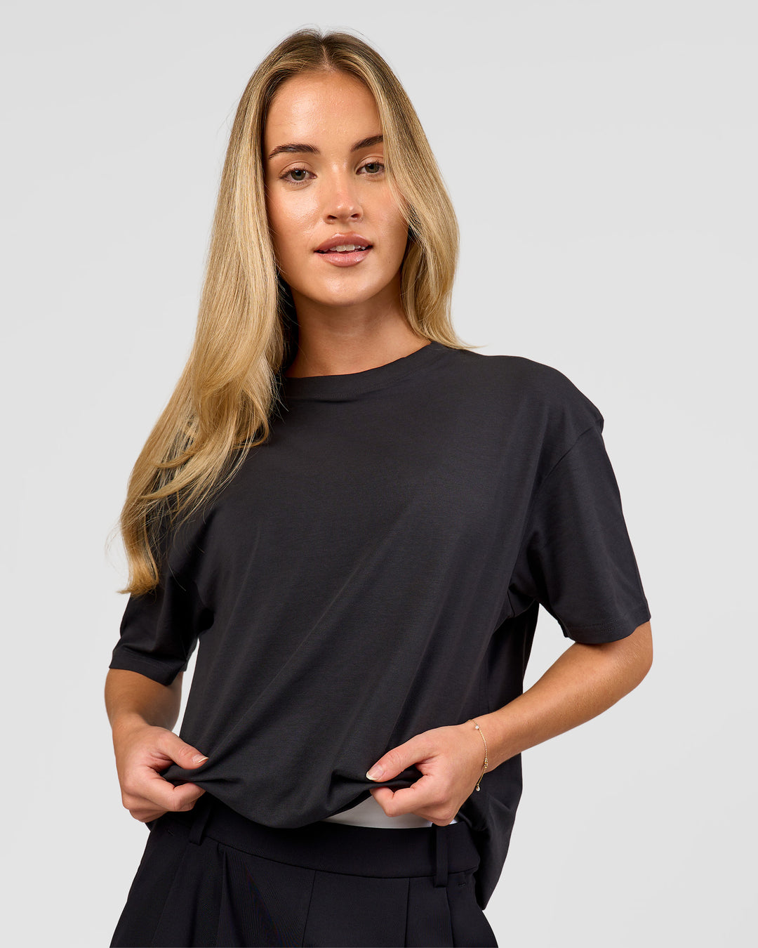Woman wearing Benchmark FLXCotton Oversized Tee - Onyx-Yellow Fizz | Model:Issy | Size:XS - view 14