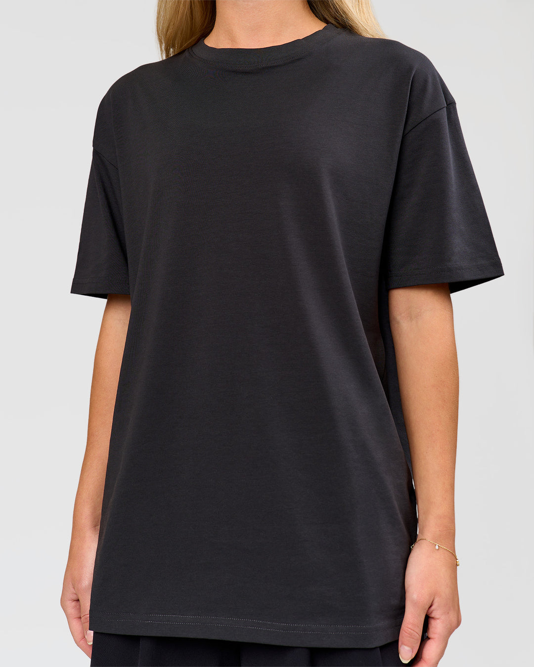 Woman wearing Benchmark FLXCotton Oversized Tee - Onyx-Yellow Fizz | Model:Issy | Size:XS - view 16