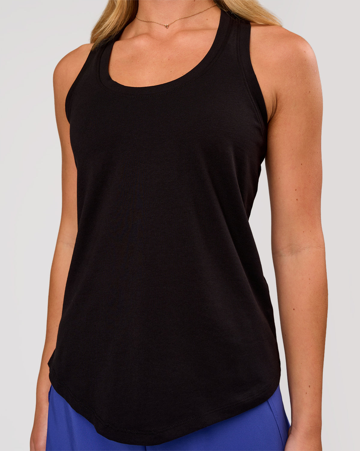 Woman wearing Force FLXCotton Longline Tank - Black | Model:Issy | Size:XS