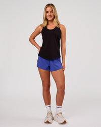 Woman wearing Force FLXCotton Longline Tank - Black | Model:Issy | Size:XS | Thumbnail Index: 3