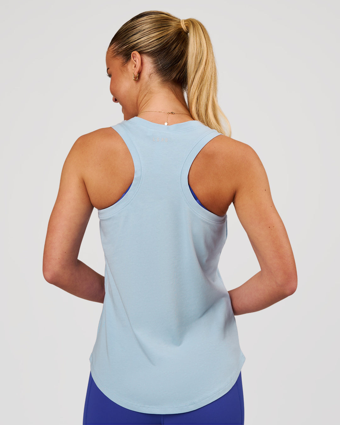 Woman wearing Force FLXCotton Longline Tank - Open Air | Model:Issy | Size:XS - view 5
