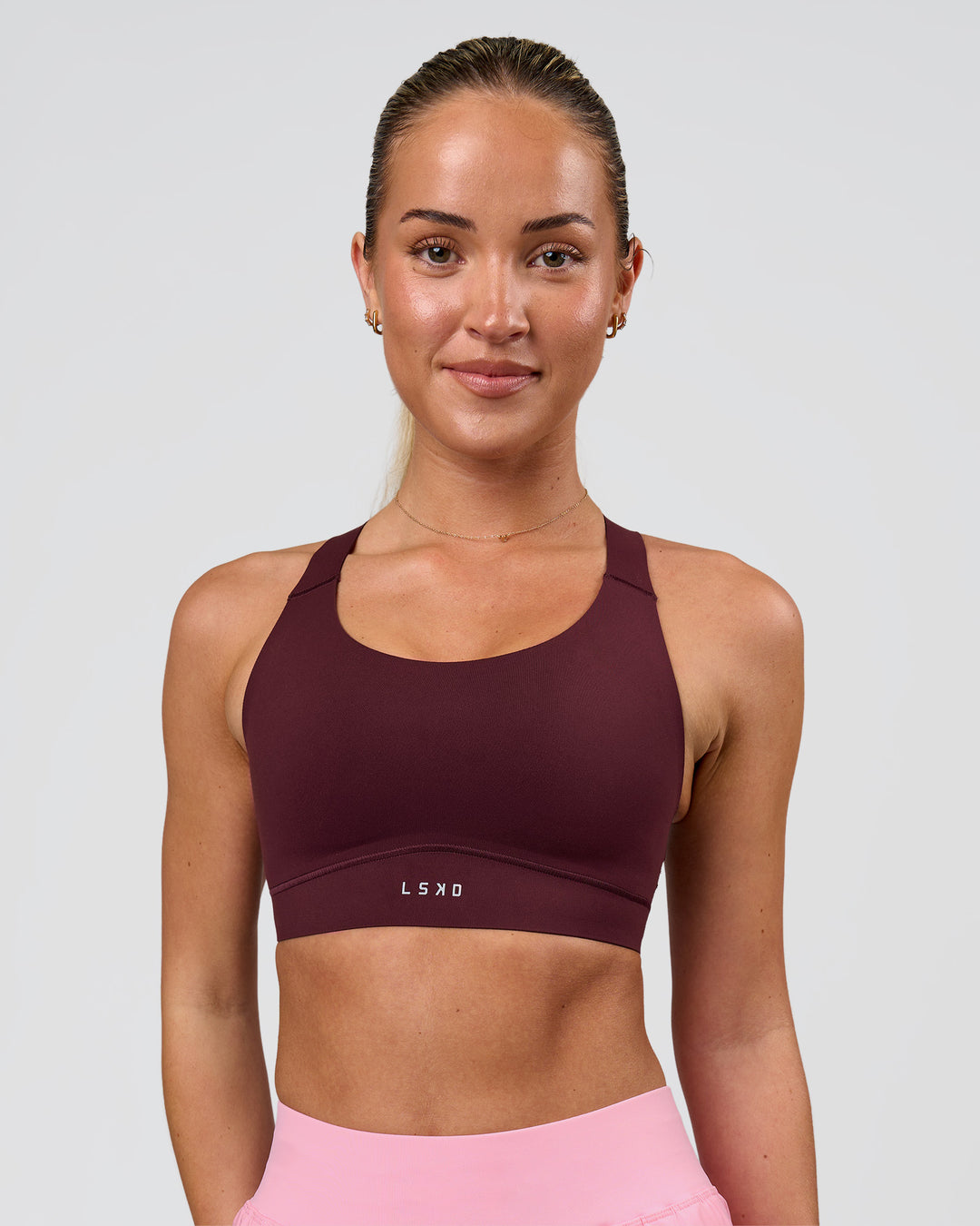 Woman wearing Fusion Sports Bra 2.0 - Cherry Lacquer | Model:Issy | Size:XS - view 3