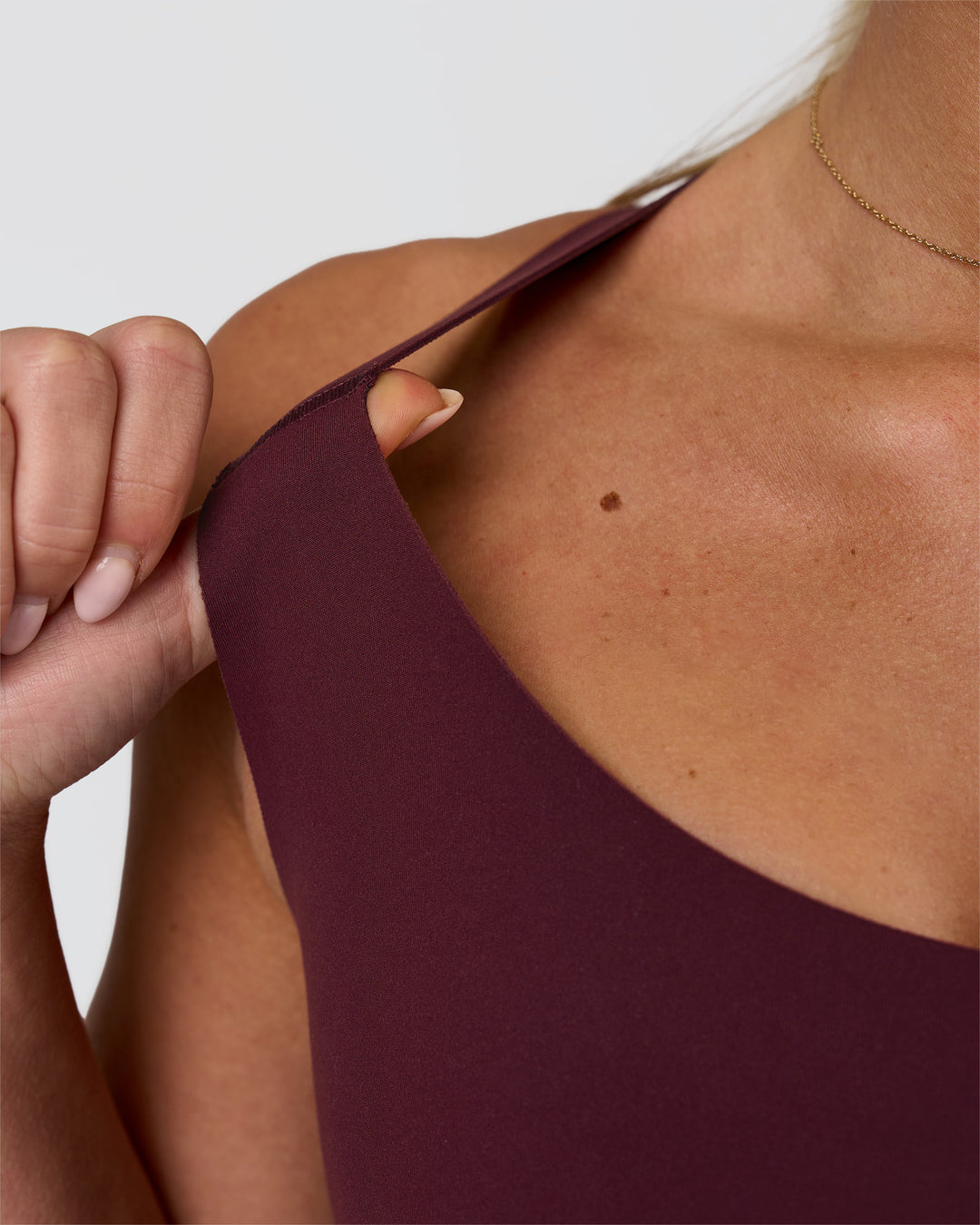 Woman wearing Fusion Sports Bra 2.0 - Cherry Lacquer | Model:Issy | Size:XS - view 9