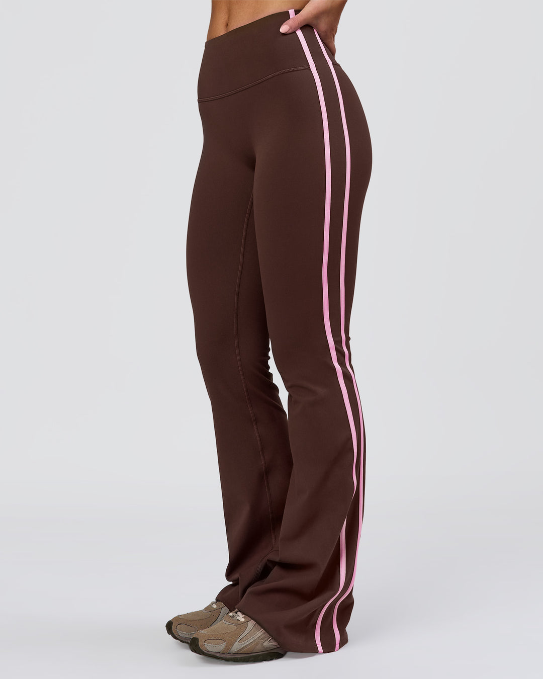 Woman wearing Fusion V-Contour Bind High-Rise Flared Legging - Hot Chocolate-Pink Rose | Model:Issy | Size:XS - view 1