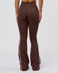 Woman wearing Fusion V-Contour Bind High-Rise Flared Legging - Hot Chocolate-Pink Rose | Model:Issy | Size:XS | Thumbnail Index: 11