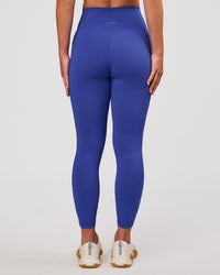 Woman wearing Fusion V-Contour Ultra High-Rise 7/8 Legging Pockets - Power Cobalt | Model:Issy | Size:XS | Thumbnail Index: 7