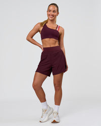Woman wearing Galvanise Sports Bra 2.0 - Cherry Lacquer-Multi | Model:Issy | Size:XS | Thumbnail Index: 5