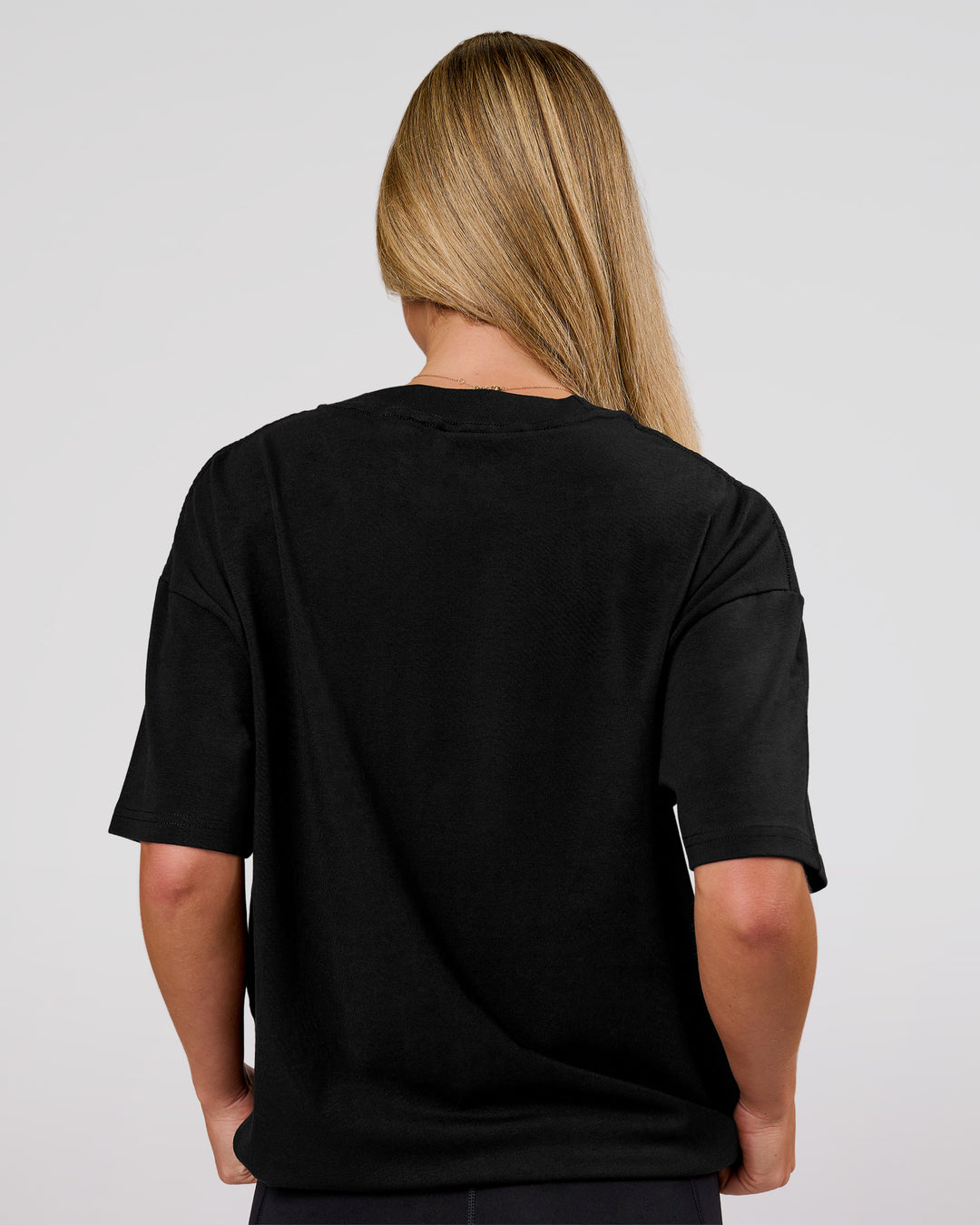 Woman wearing Game Plan Heavyweight FLXCotton Oversized Tee - Black | Model:Issy | Size:XS - view 13