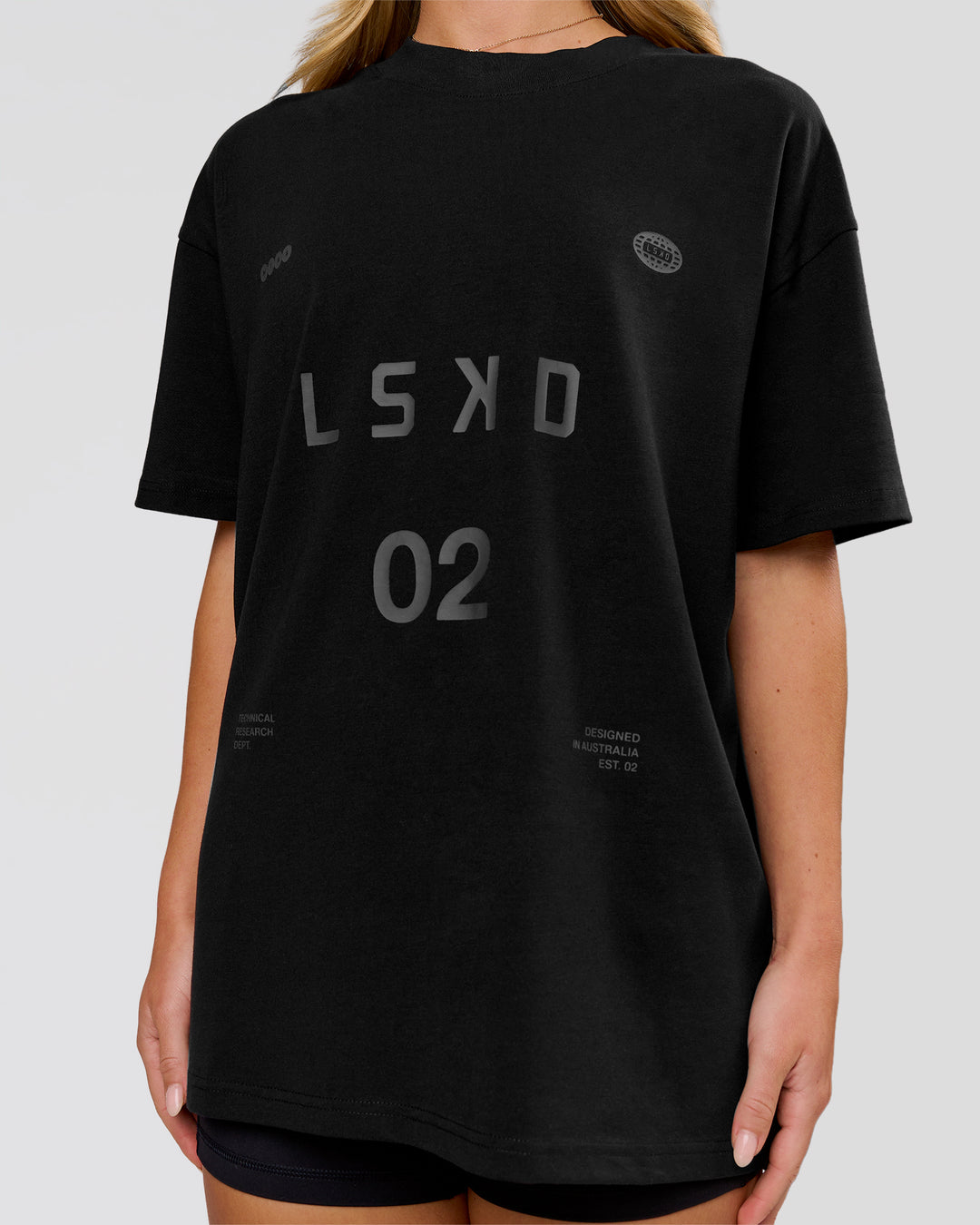 Woman wearing Game Plan Heavyweight FLXCotton Oversized Tee - Black | Model:Issy | Size:XS - view 15