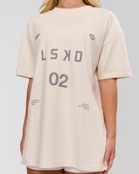 Woman wearing Game Plan Heavyweight FLXCotton Oversized Tee - Vanilla Bean | Model:Issy | Size:XS | Thumbnail Index: 6