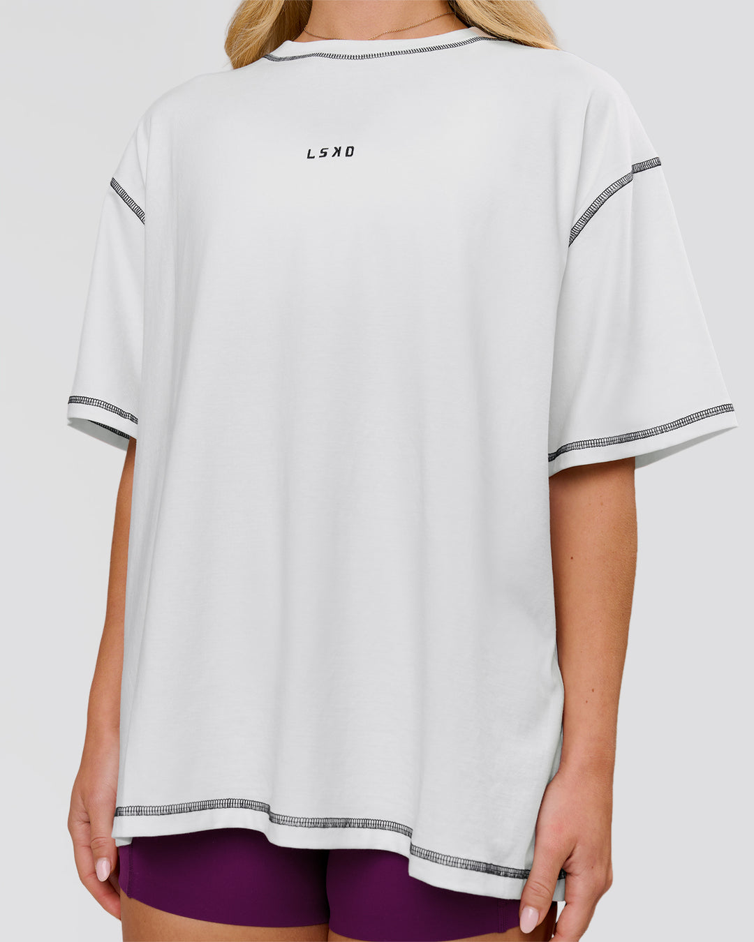Woman wearing Go-To Contrast Oversized Heavyweight FLXCotton Tee - White-Black | Model:Issy | Size:XS - view 5