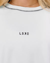 Woman wearing Go-To Contrast Oversized Heavyweight FLXCotton Tee - White-Black | Model:Issy | Size:XS | Thumbnail Index: 2