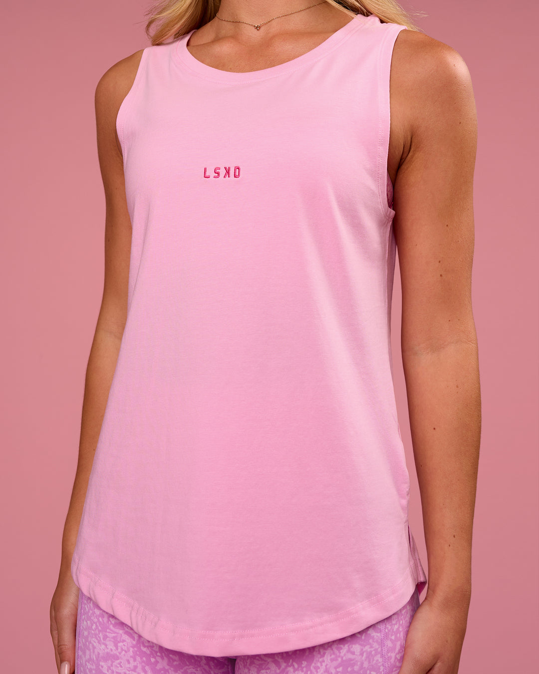 Woman wearing Go-To FLXCotton Longline Tank - Pink Rose-Ultra Pink | Model:Issy | Size:XS - view 2