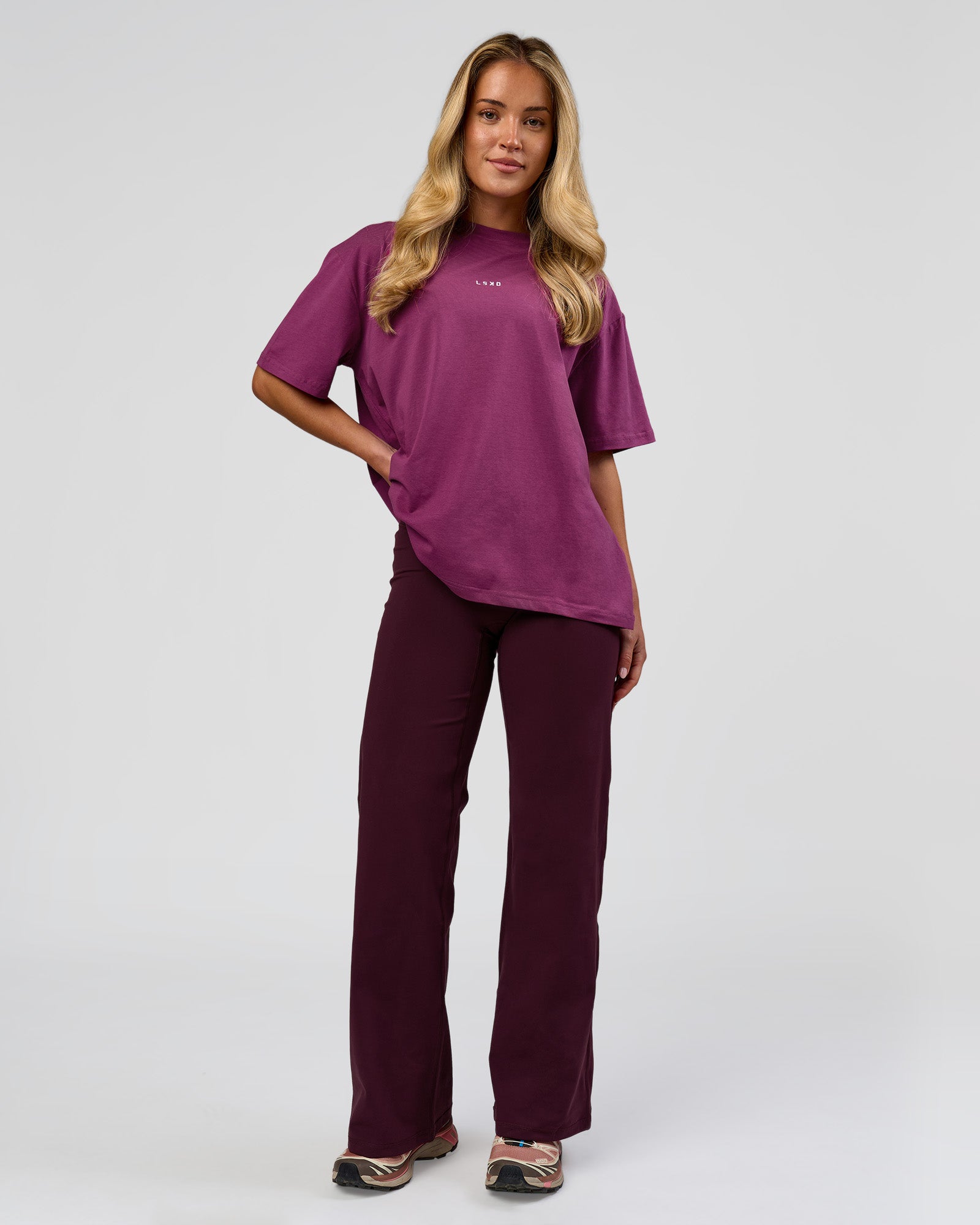 Woman wearing Go-To FLXCotton Oversized Tee - Boysenberry-White | Model:Issy | Size:XS