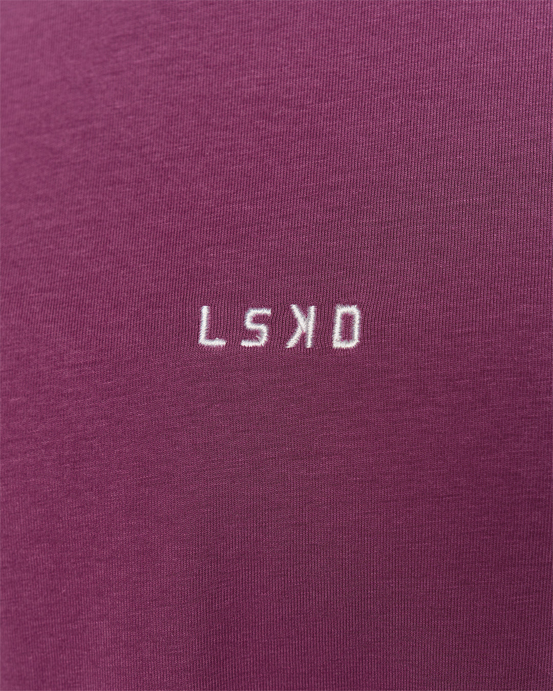 Woman wearing Go-To FLXCotton Oversized Tee - Boysenberry-White | Model:Issy | Size:XS - view 4
