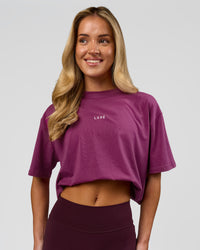Woman wearing Go-To FLXCotton Oversized Tee - Boysenberry-White | Model:Issy | Size:XS | Thumbnail Index: 5