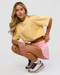 Woman wearing Go-To FLXCotton Oversized Tee - Lemon-White | Model:Issy | Size:XS | Thumbnail Index: 1