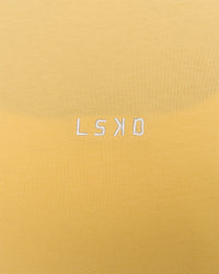 Woman wearing Go-To FLXCotton Oversized Tee - Lemon-White | Model:Issy | Size:XS | Thumbnail Index: 3