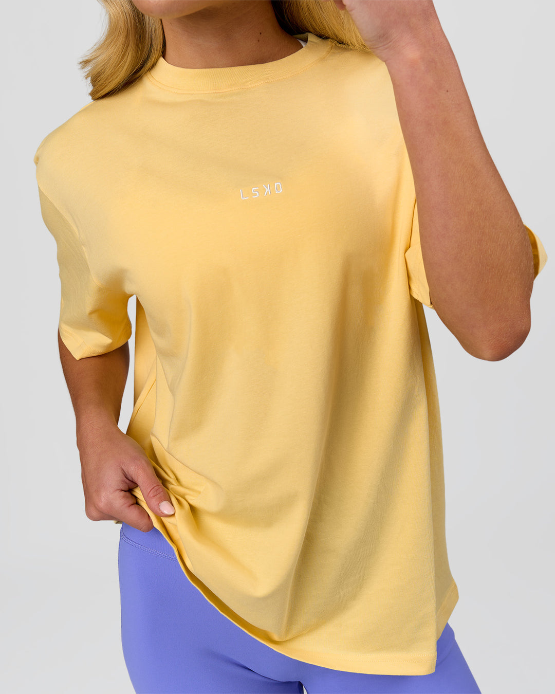 Woman wearing Go-To FLXCotton Oversized Tee - Lemon-White | Model:Issy | Size:XS - view 6