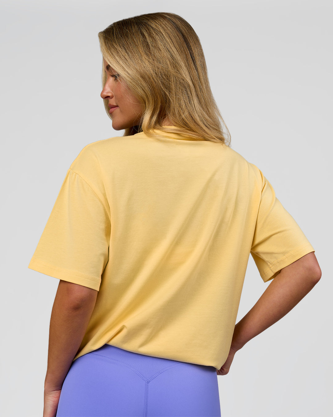 Woman wearing Go-To FLXCotton Oversized Tee - Lemon-White | Model:Issy | Size:XS - view 8