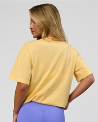 Woman wearing Go-To FLXCotton Oversized Tee - Lemon-White | Model:Issy | Size:XS | Thumbnail Index: 7