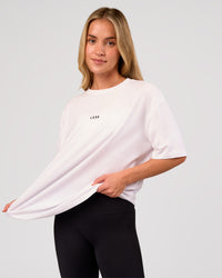 Woman wearing Go-To FLXCotton Oversized Tee - White-Black | Model:Issy | Size:XS | Thumbnail Index: 3