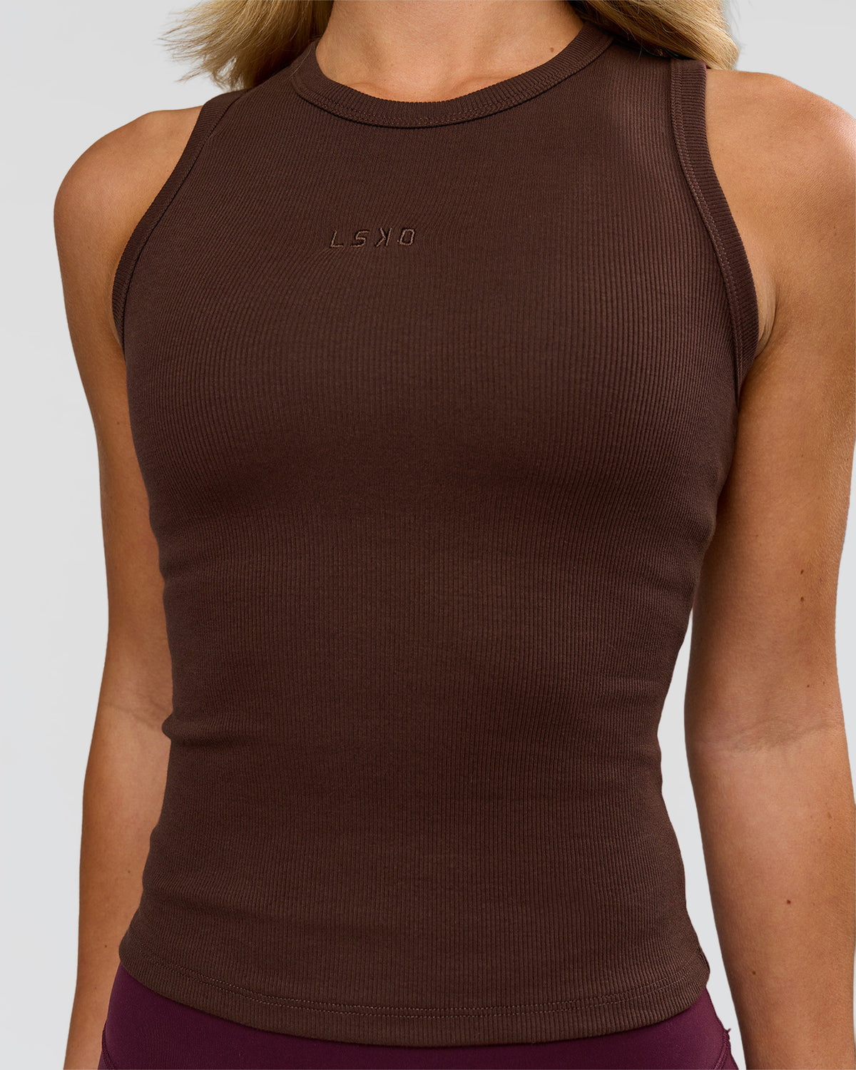Woman wearing Go-To FLXCotton Rib High Neck Tank - Hot Chocolate | Model:Issy | Size:XS