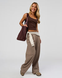 Woman wearing Go-To FLXCotton Rib Scoop Tank - Hot Chocolate | Model:Issy | Size:XS | Thumbnail Index: 9