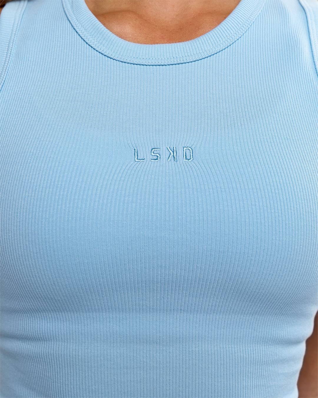 Woman wearing Go-To FLXCotton Rib High Neck Tank - Open Air | Model:Issy | Size:XS - view 9