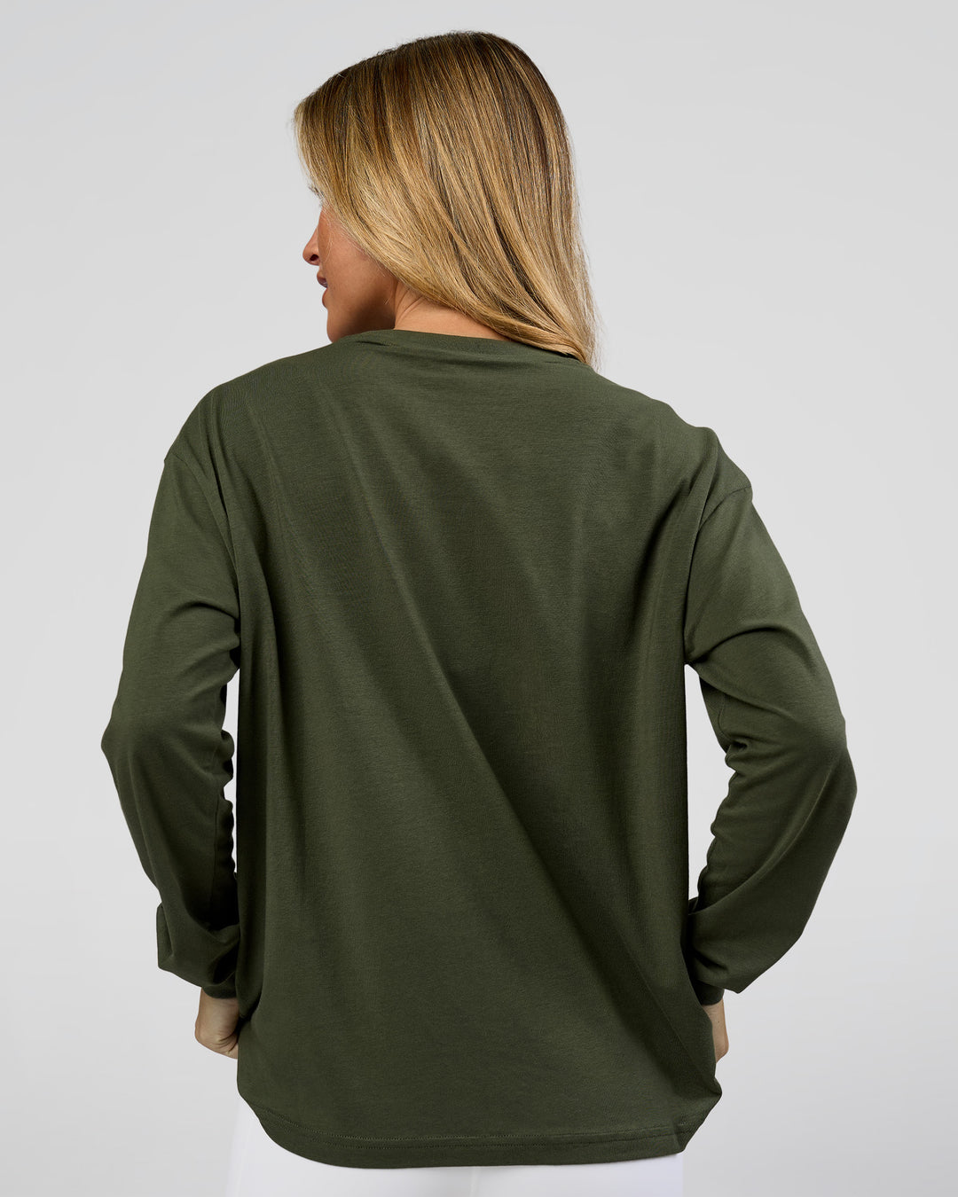 Woman wearing Go-To Long Sleeve FLXCotton Oversized Tee - Pure Olive-White | Model:Issy | Size:XS - view 2