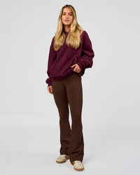 Woman wearing Go-To Oversized Hoodie - Cherry Lacquer | Model:Issy | Size:XS | Thumbnail Index: 2
