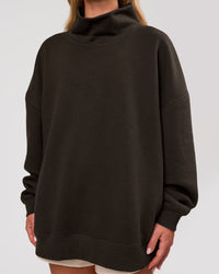 Woman wearing Go-To Oversized Mock Neck Sweater - Ground Coffee | Model:Issy | Size:XS | Thumbnail Index: 1