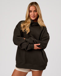 Woman wearing Go-To Oversized Mock Neck Sweater - Ground Coffee | Model:Issy | Size:XS | Thumbnail Index: 4