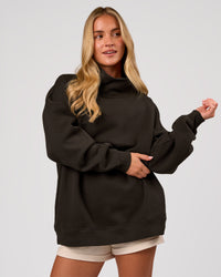 Woman wearing Go-To Oversized Mock Neck Sweater - Ground Coffee | Model:Issy | Size:XS | Thumbnail Index: 7